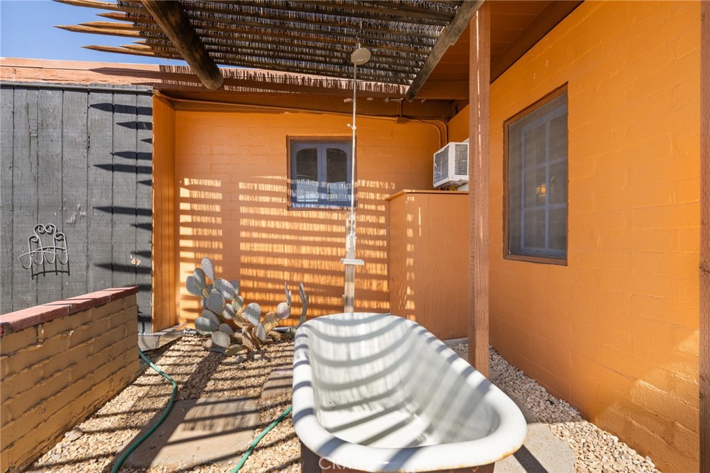 5148 Godwin Road Twentynine Palms, CA 92277 - Photo 29 of 39 a bathroom with a sink toilet and shower