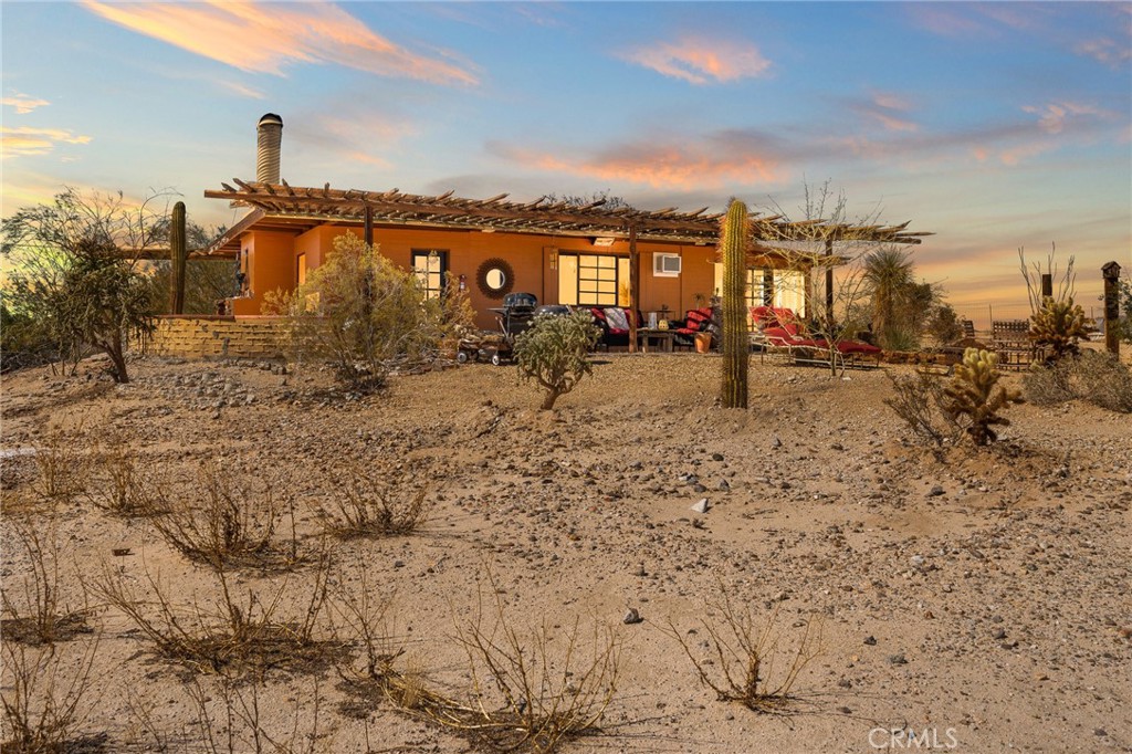 5148 Godwin Road Twentynine Palms, CA 92277 - Photo 6 of 39 a view of a terrace with lawn chairs
