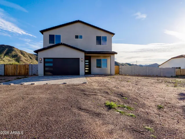 a house view with a outdoor space