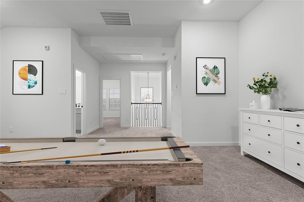 8310 Amethyst Valley Lane Angleton, TX 77515 - Photo 6 of 7 a view of a bedroom with wooden floor and cabinet
