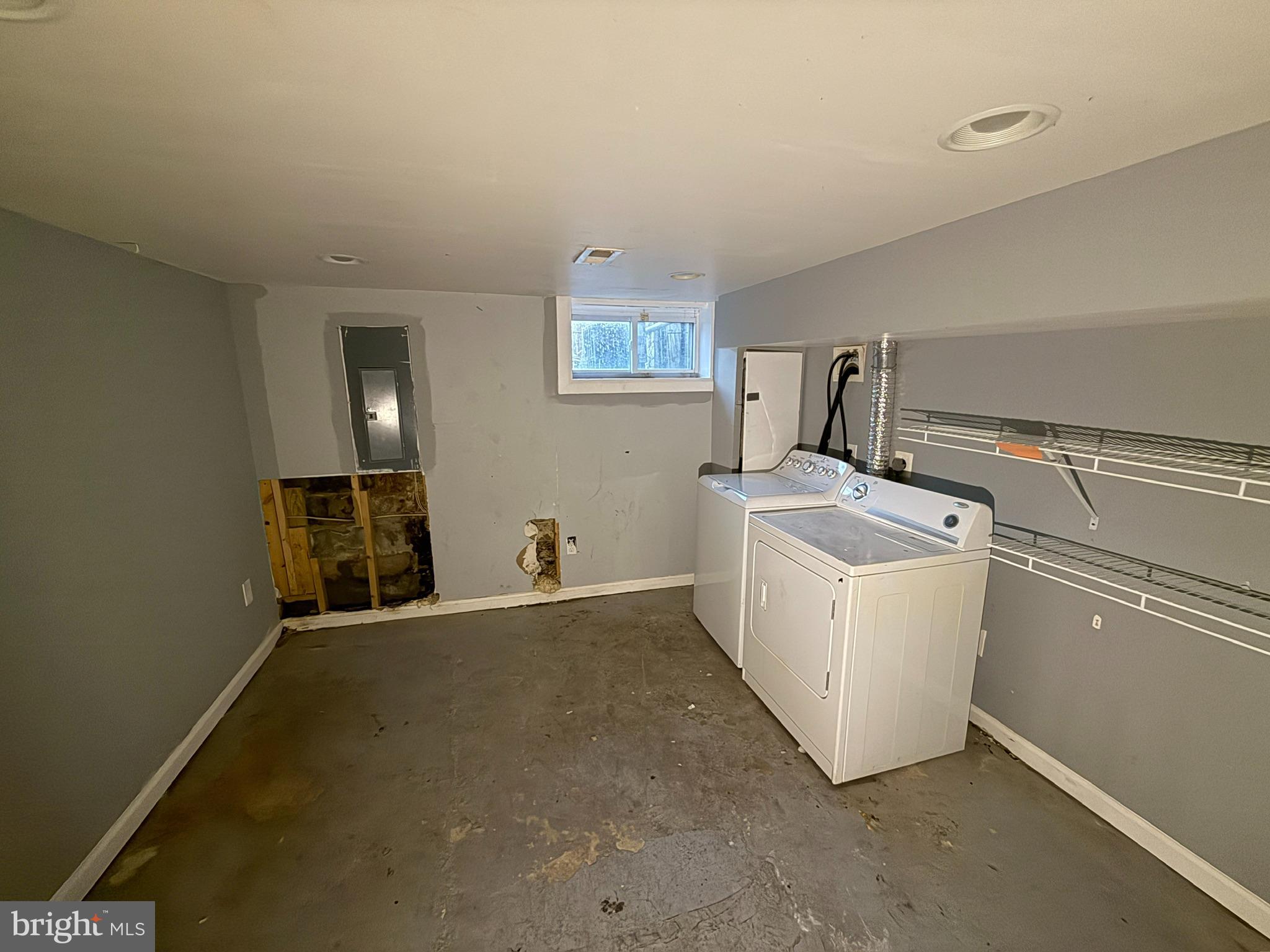 117 North Janney Street Baltimore, MD 21224 - Photo 13 of 13 a view of a storage & utility room with washer and dryer