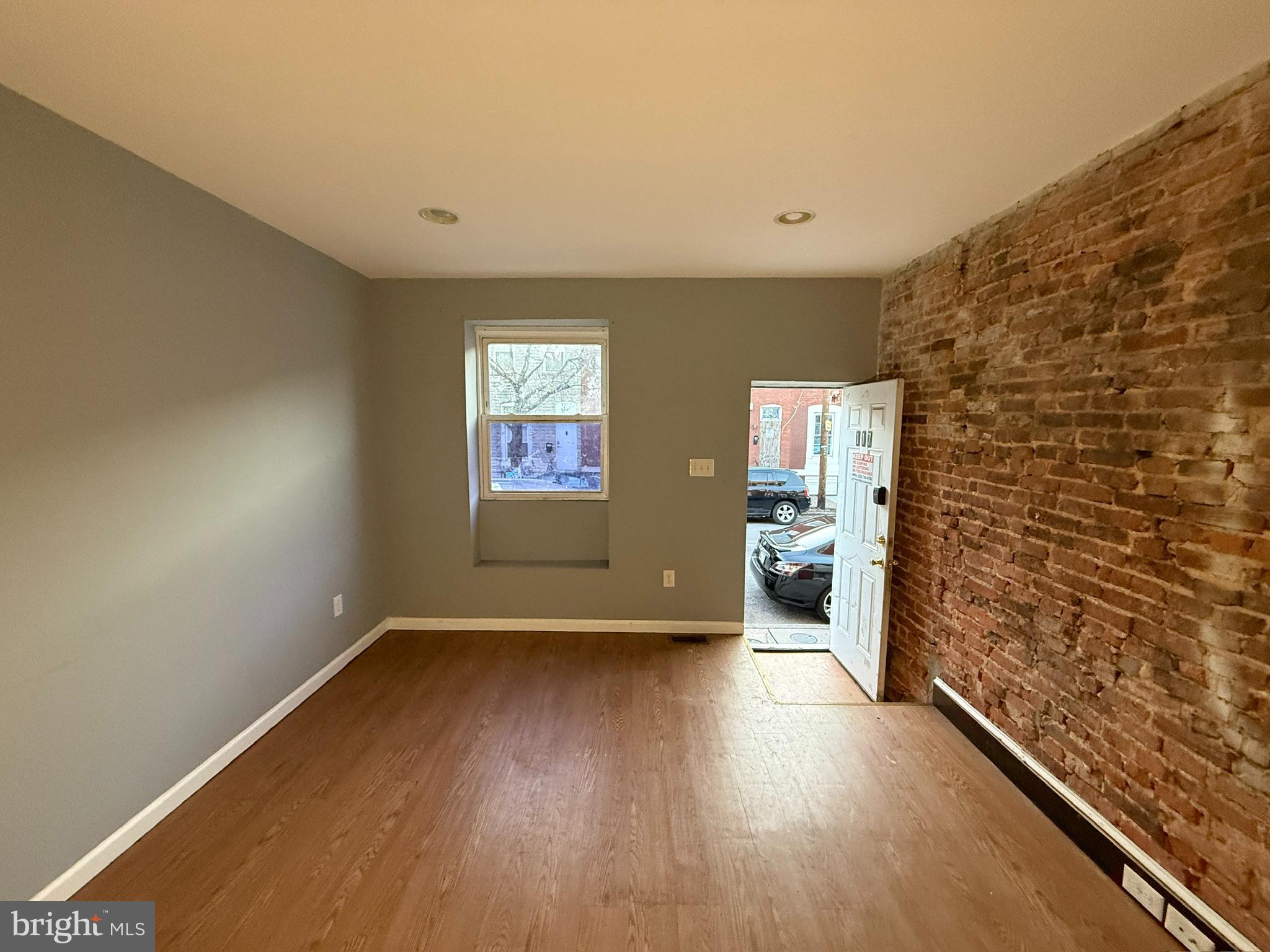 117 North Janney Street Baltimore, MD 21224 - Photo 2 of 13 a view of empty room with wooden floor
