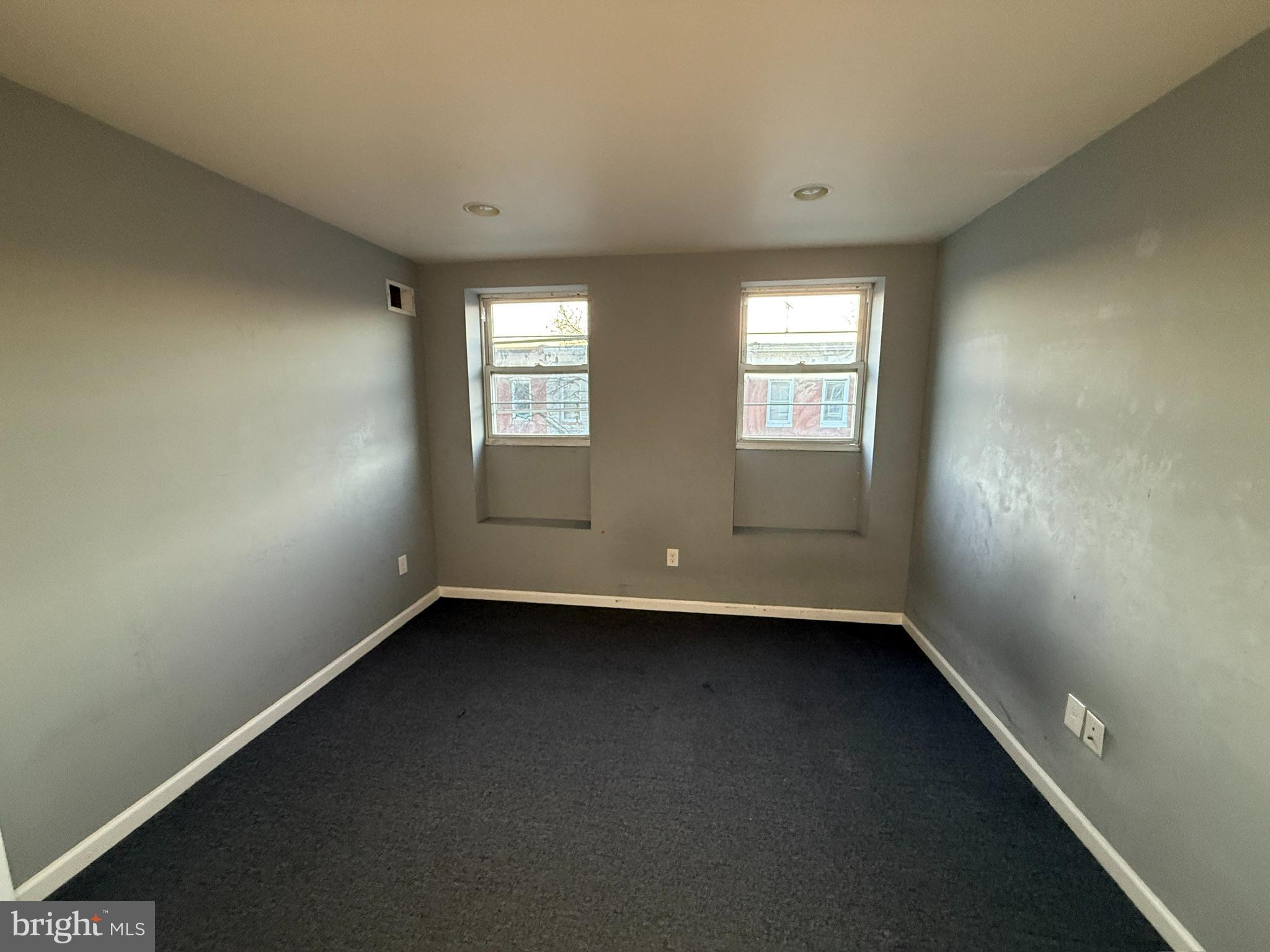 117 North Janney Street Baltimore, MD 21224 - Photo 7 of 13 an empty room with a window
