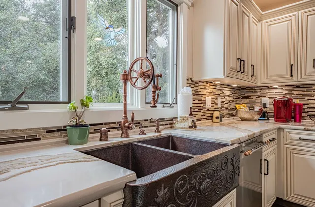 a bedroom with a large bed and a table