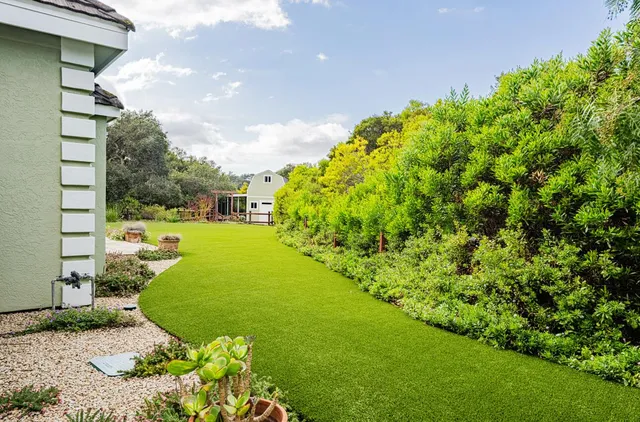 a bathroom with a tub and a sink