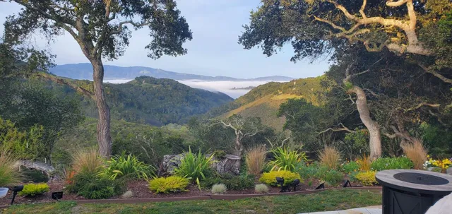 a view of outdoor sitting area with golf course