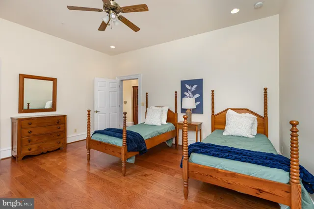 a view of a workspace with furniture and window