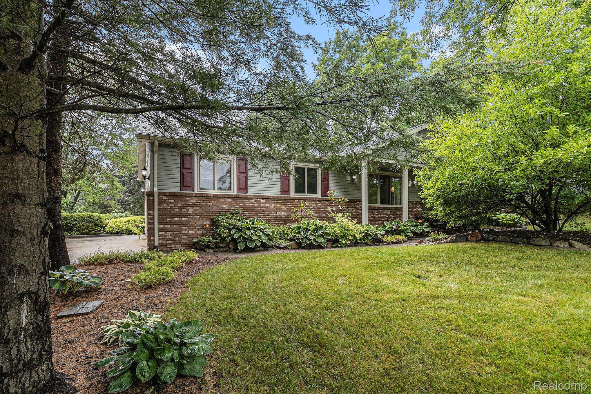 1746 Ridge Road White Lake, MI 48383 - Photo 3 of 39 Sits on Beautifully Landscaped 1/2 Acre Lot