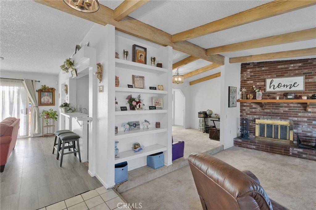 13167 Olathe Road Apple Valley, CA 92308 - Photo 2 of 40 a living room with furniture and wooden floor