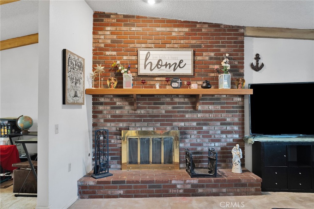 13167 Olathe Road Apple Valley, CA 92308 - Photo 4 of 40 a building with a clock on it