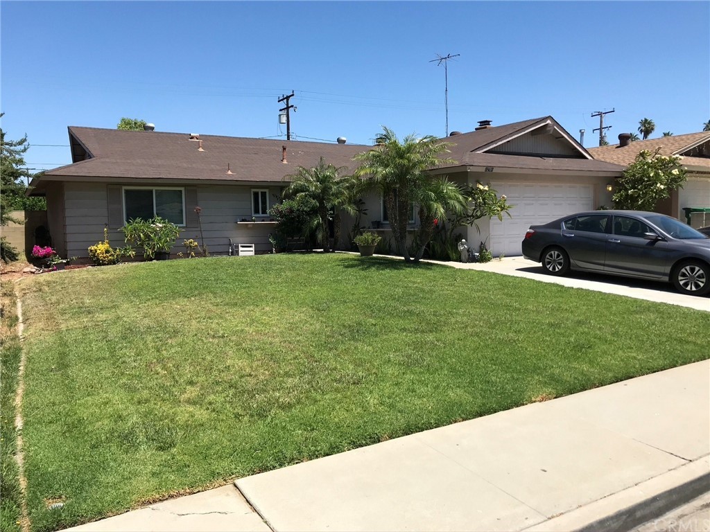 12751 Harlow Avenue Riverside, CA 92503 - Photo 1 of 1 a front view of a house with a garden