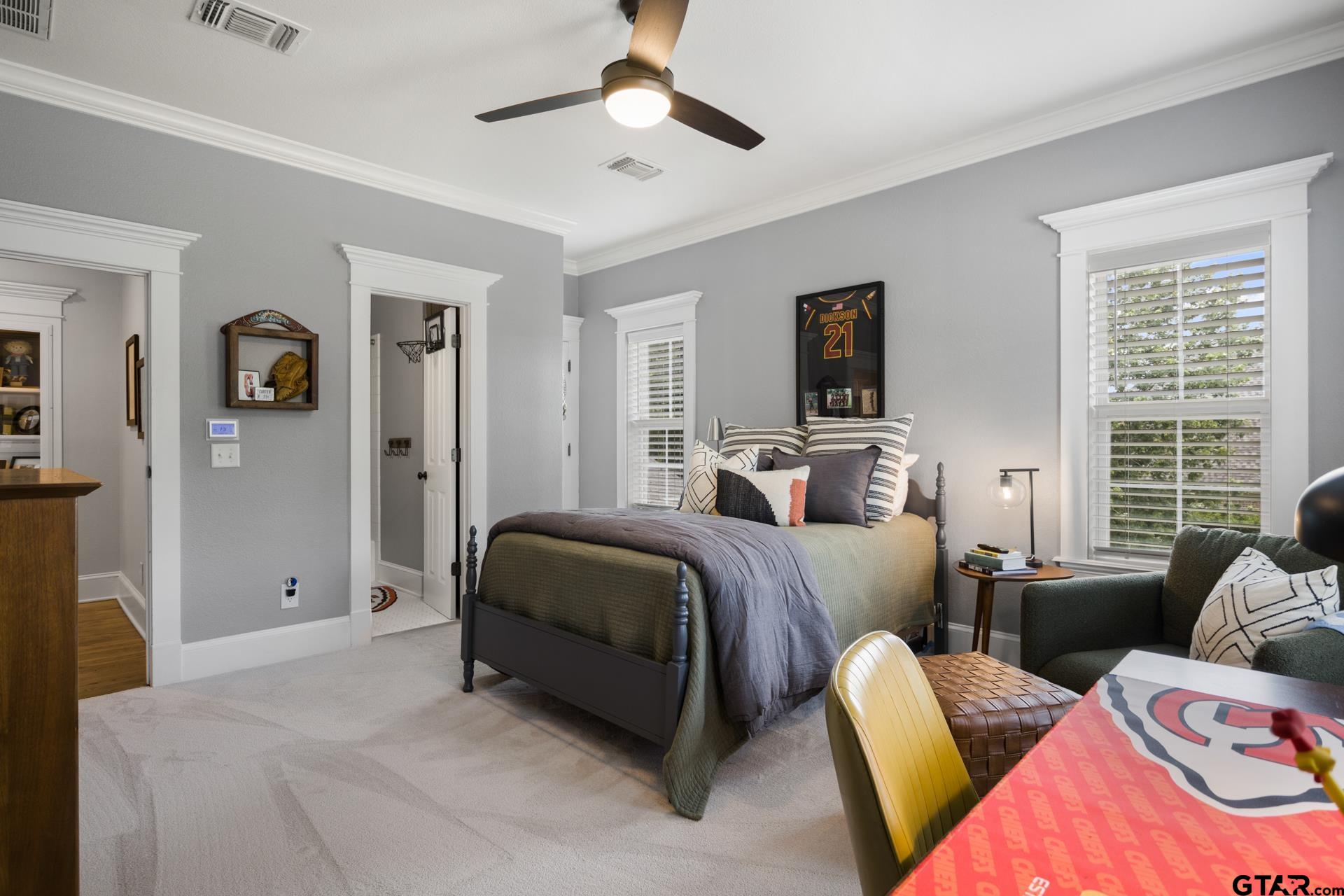 134 Private Road New Boston, TX 75570 - Photo 29 of 40 a living room with a bed furniture and a window