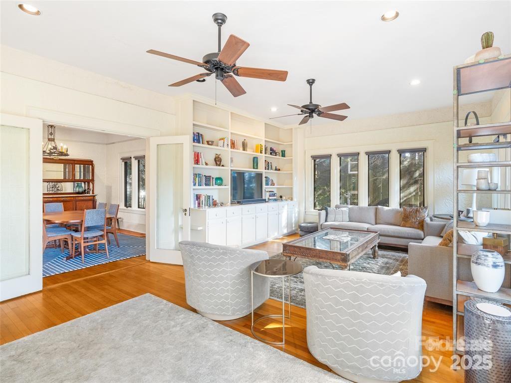 26 Sheridan Road Asheville, NC 28803 - Photo 12 of 46 a living room with furniture and a large window