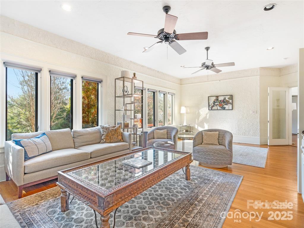 26 Sheridan Road Asheville, NC 28803 - Photo 13 of 46 a living room with furniture and a rug