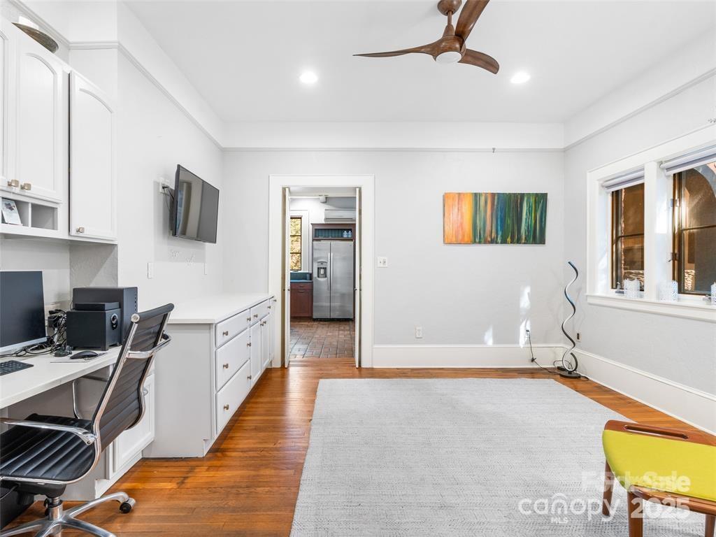 26 Sheridan Road Asheville, NC 28803 - Photo 18 of 46 a living room with furniture and a flat screen tv