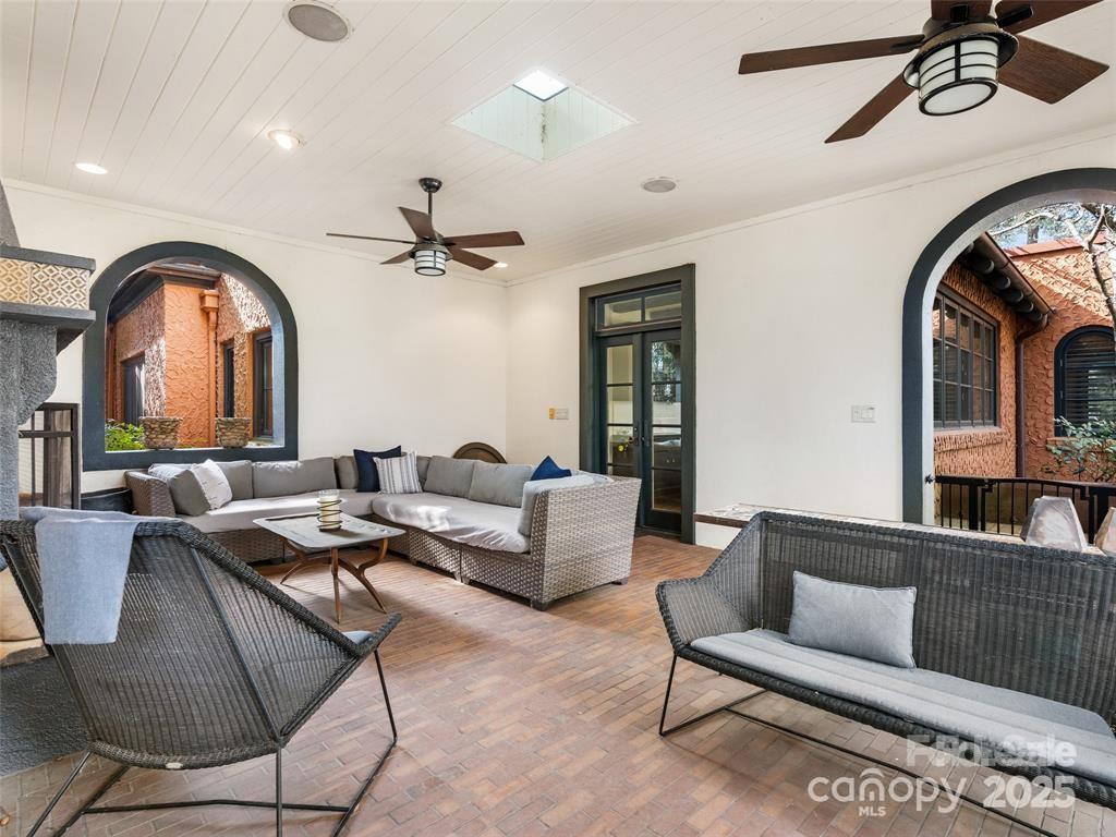 26 Sheridan Road Asheville, NC 28803 - Photo 29 of 46 a living room with furniture and a large window