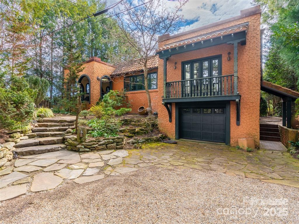 26 Sheridan Road Asheville, NC 28803 - Photo 42 of 46 a front view of a house with a yard