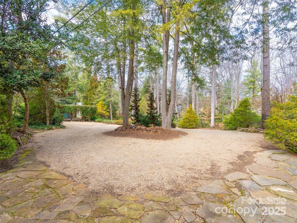 26 Sheridan Road Asheville, NC 28803 - Photo 44 of 46 a view of a road with trees