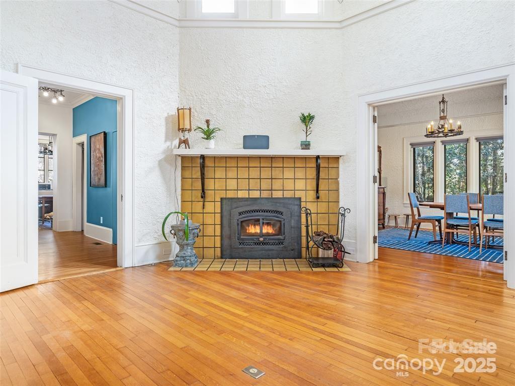 26 Sheridan Road Asheville, NC 28803 - Photo 10 of 46 a living room with furniture and a fireplace