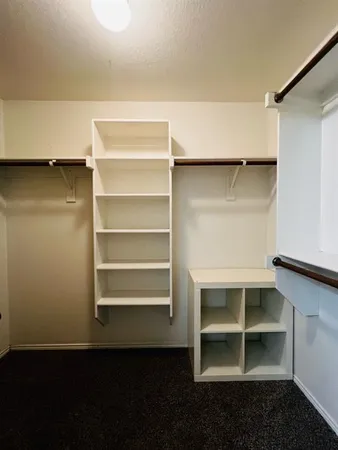 a view of a room with rack on the wall