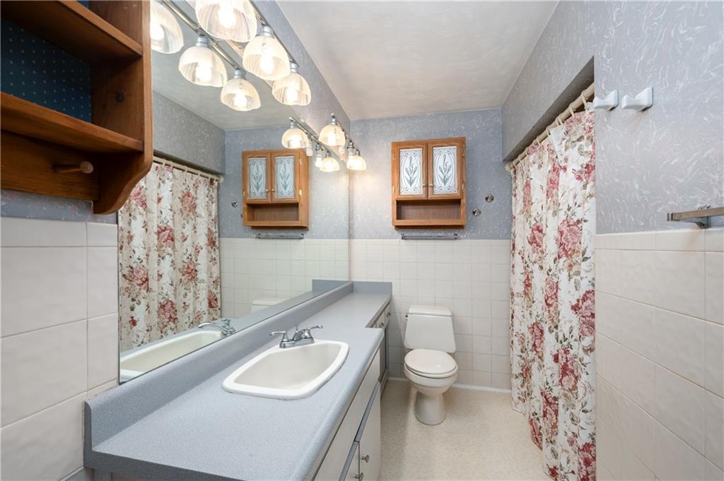 501 Bear Creek Road Sarver, PA 16055 - Photo 17 of 30 a bathroom with a sink toilet and shower