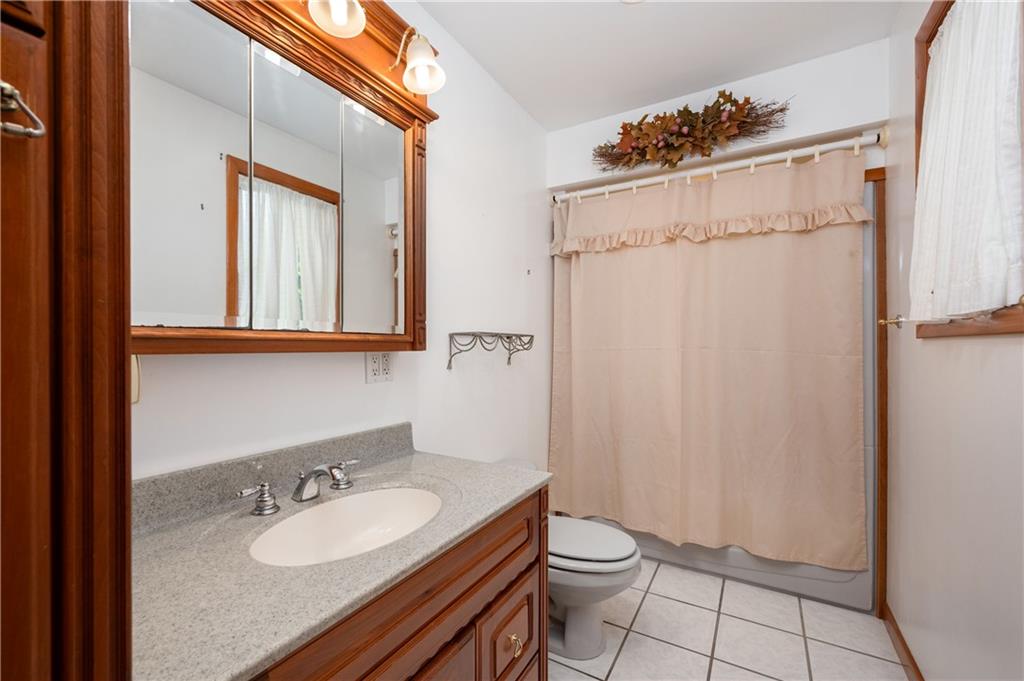 501 Bear Creek Road Sarver, PA 16055 - Photo 22 of 30 a bathroom with a granite countertop sink toilet and shower
