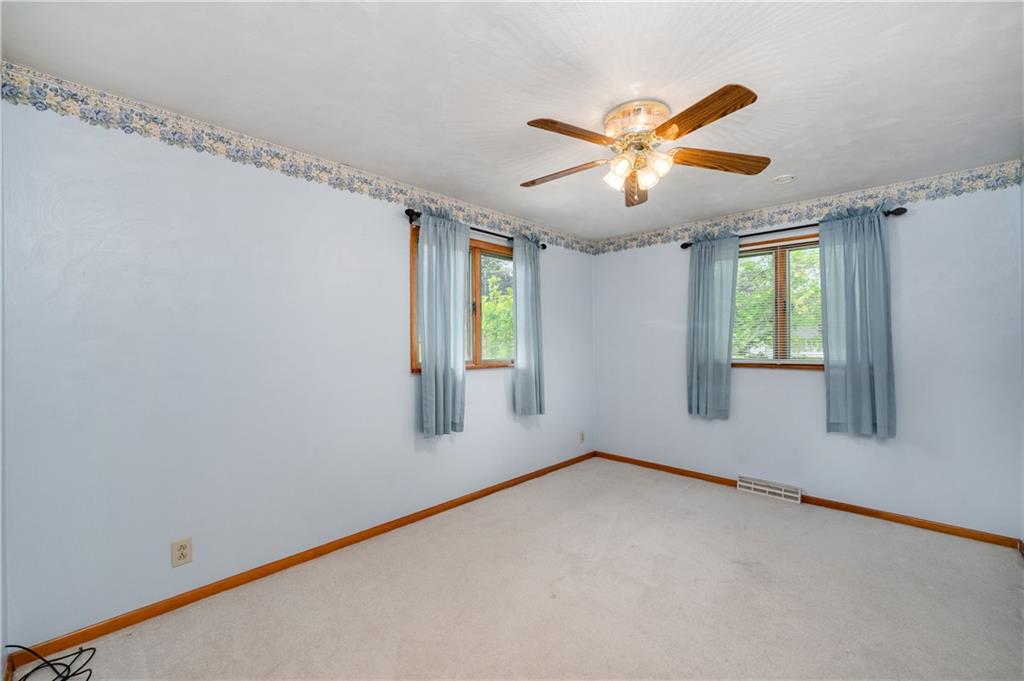 501 Bear Creek Road Sarver, PA 16055 - Photo 23 of 30 a view of a livingroom with a ceiling fan and window