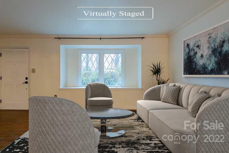 2522 Merrywood Road Charlotte, NC 28210 - Photo 2 of 21 a living room with furniture and a couch