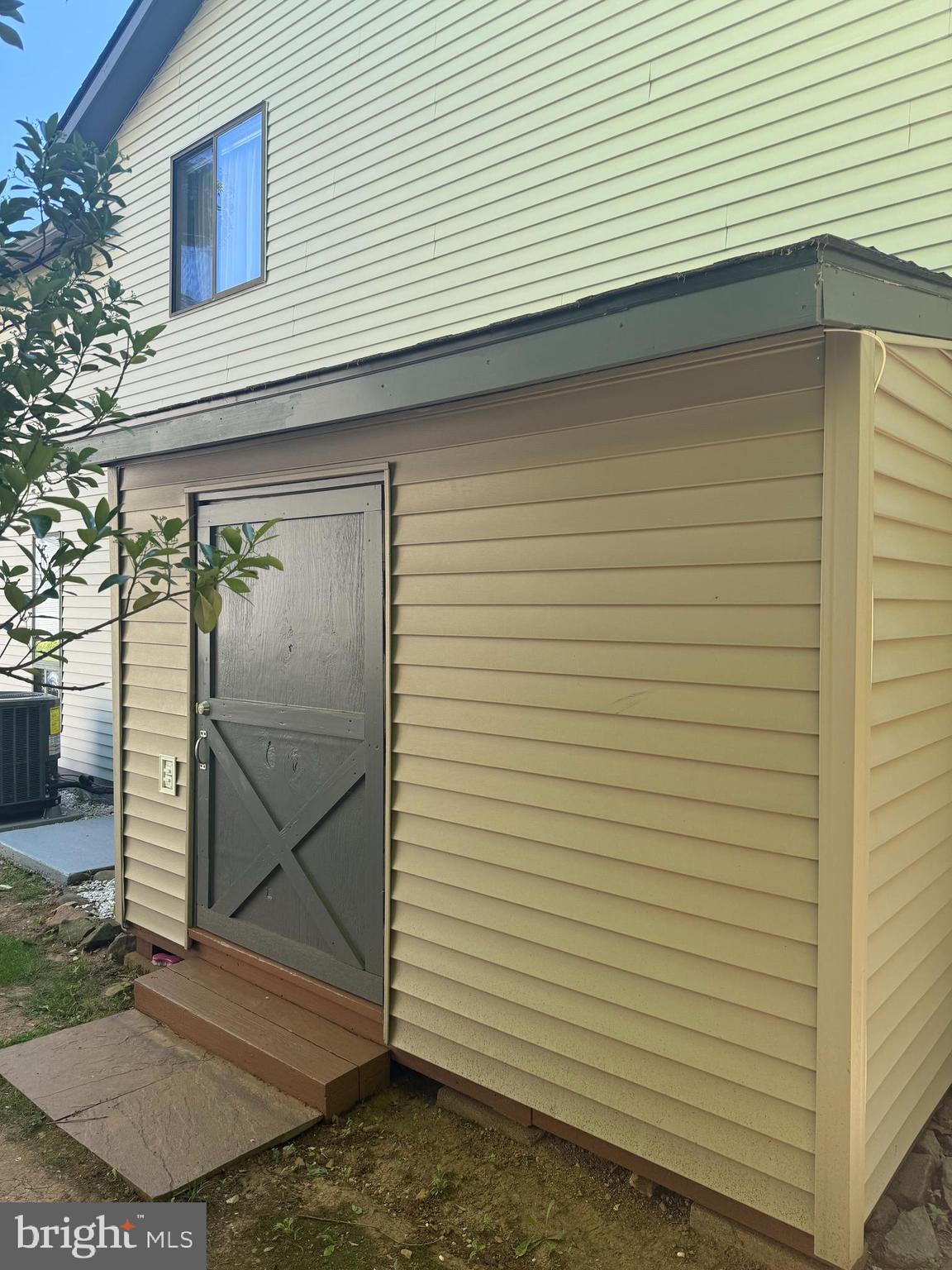 211 Keyes Court Sterling, VA 20164 - Photo 26 of 37 Storage shed on the right side of home