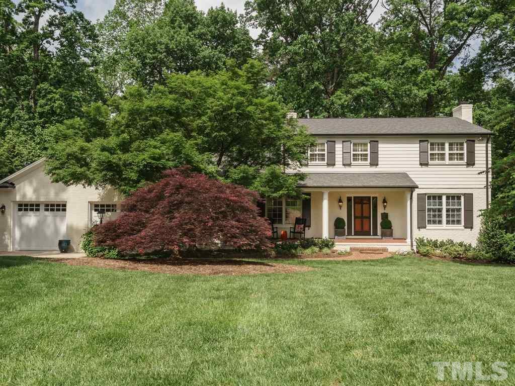3116 Eton Road Raleigh, NC 27608 - Photo 1 of 25 a front view of a house with a garden