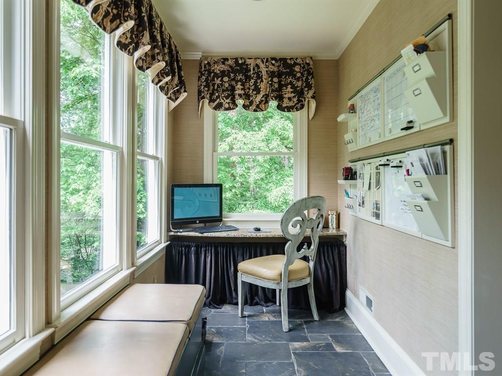 3116 Eton Road Raleigh, NC 27608 - Photo 13 of 25 a view of a dining room with furniture window and outside view