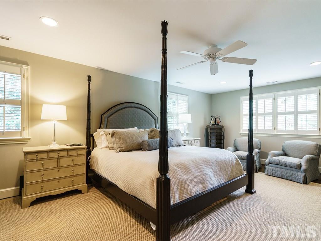 3116 Eton Road Raleigh, NC 27608 - Photo 15 of 25 a bedroom with a bed and window