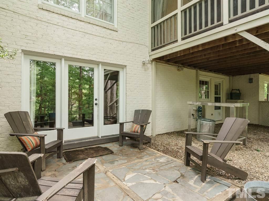 3116 Eton Road Raleigh, NC 27608 - Photo 24 of 25 a view of a dinning room and outdoor space
