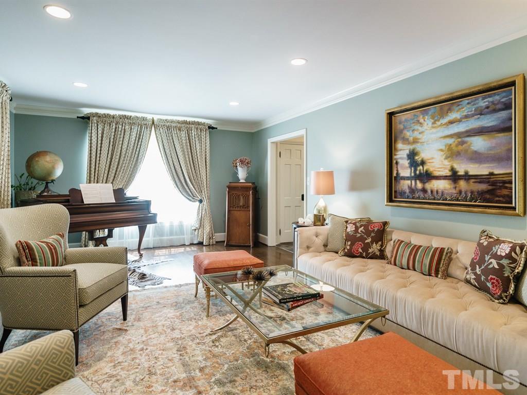 3116 Eton Road Raleigh, NC 27608 - Photo 5 of 25 a living room with furniture and a large window