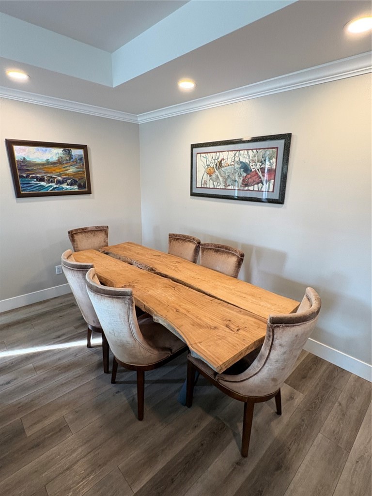 15471 Victoria Huntington Beach, CA 92647 - Photo 14 of 37 a view of a dining room with furniture and wooden floor