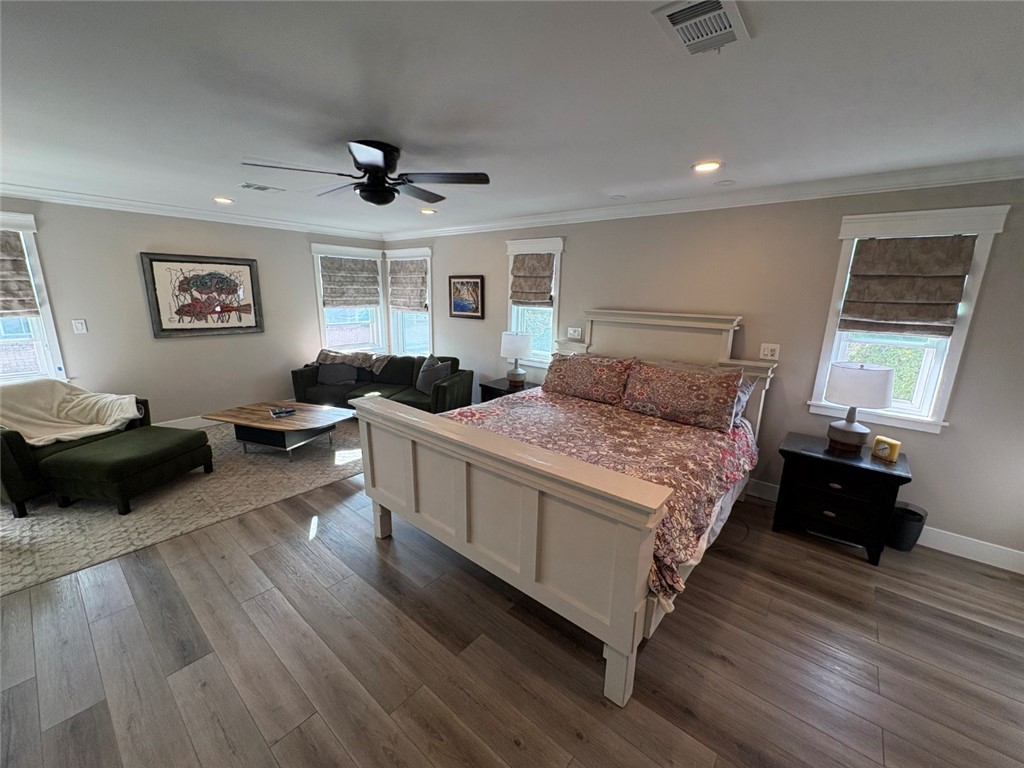 15471 Victoria Huntington Beach, CA 92647 - Photo 15 of 37 a bedroom with a bed window and a table