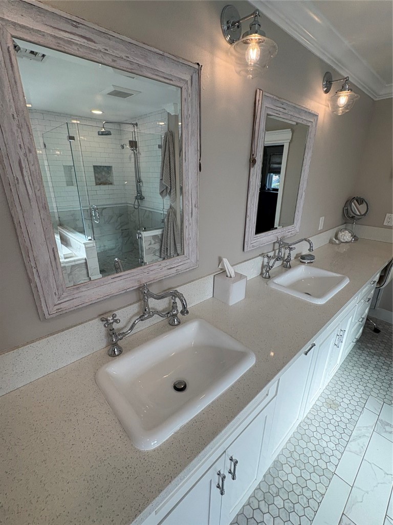 15471 Victoria Huntington Beach, CA 92647 - Photo 23 of 37 a bathroom with a sink and a mirror