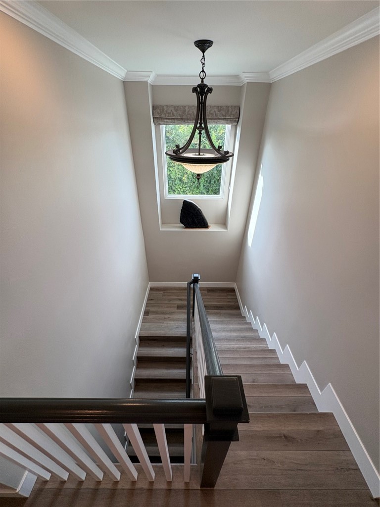 15471 Victoria Huntington Beach, CA 92647 - Photo 26 of 37 a view of entryway and hall with wooden floor