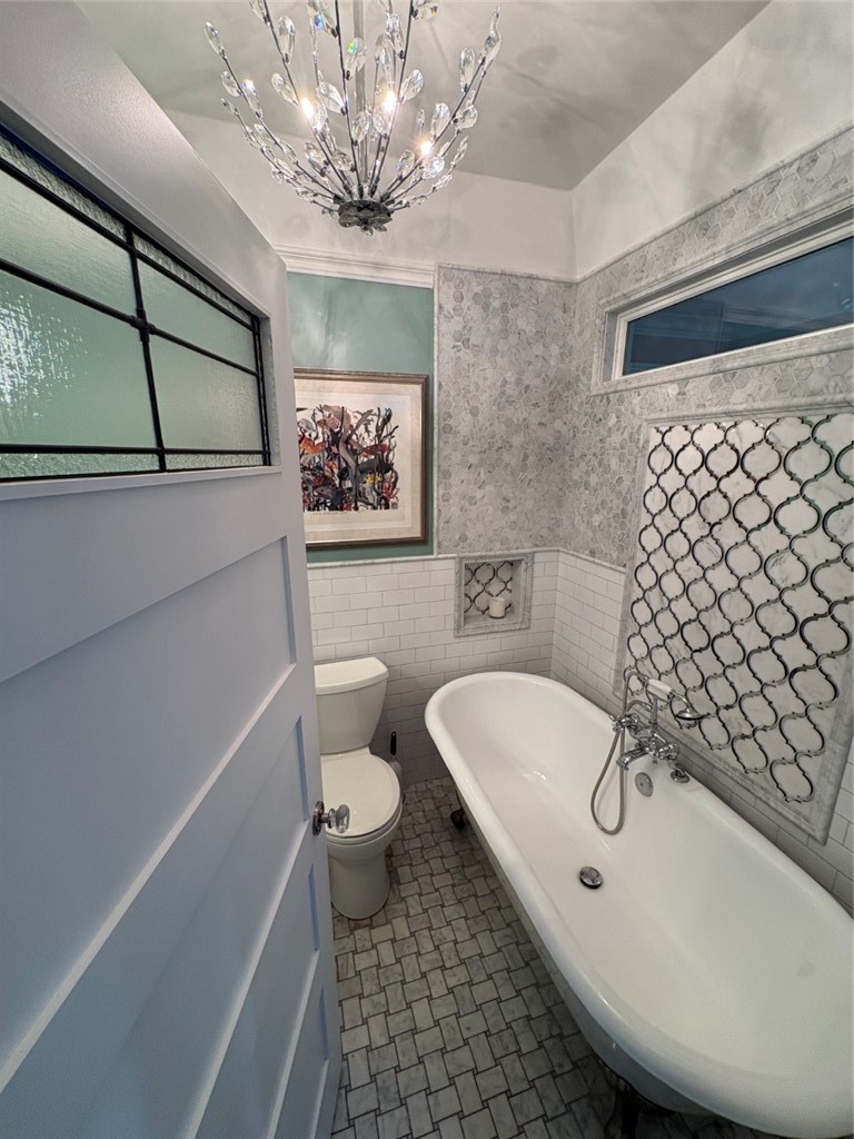 15471 Victoria Huntington Beach, CA 92647 - Photo 29 of 37 a bathroom with a sink a toilet and a shower