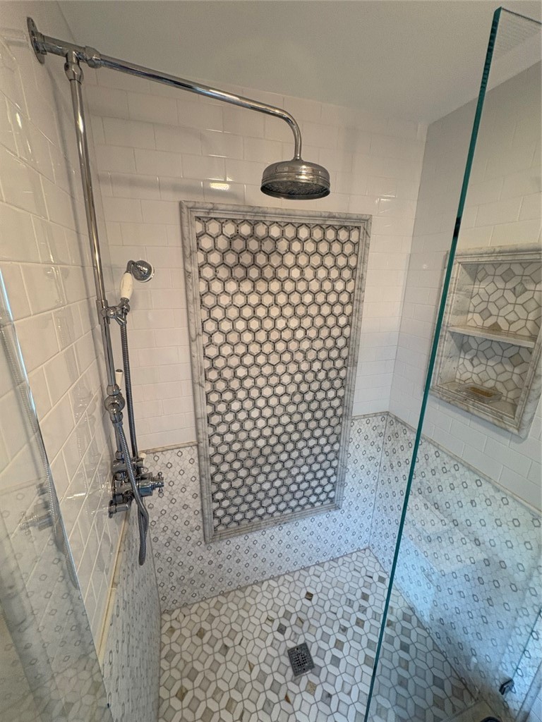 15471 Victoria Huntington Beach, CA 92647 - Photo 33 of 37 a bathroom with a shower