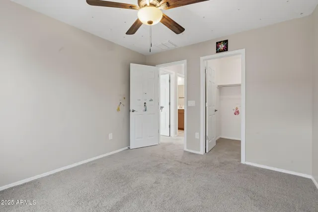 a bathroom with a double vanity sink and mirror