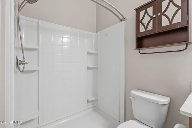a kitchen with granite countertop a sink and a stove top oven