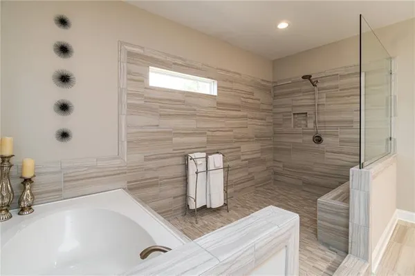 a bathroom with a sink and a shower