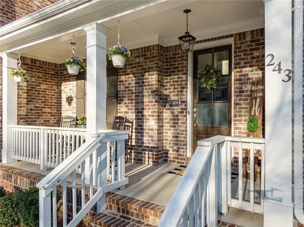 a view of a balcony with furniture