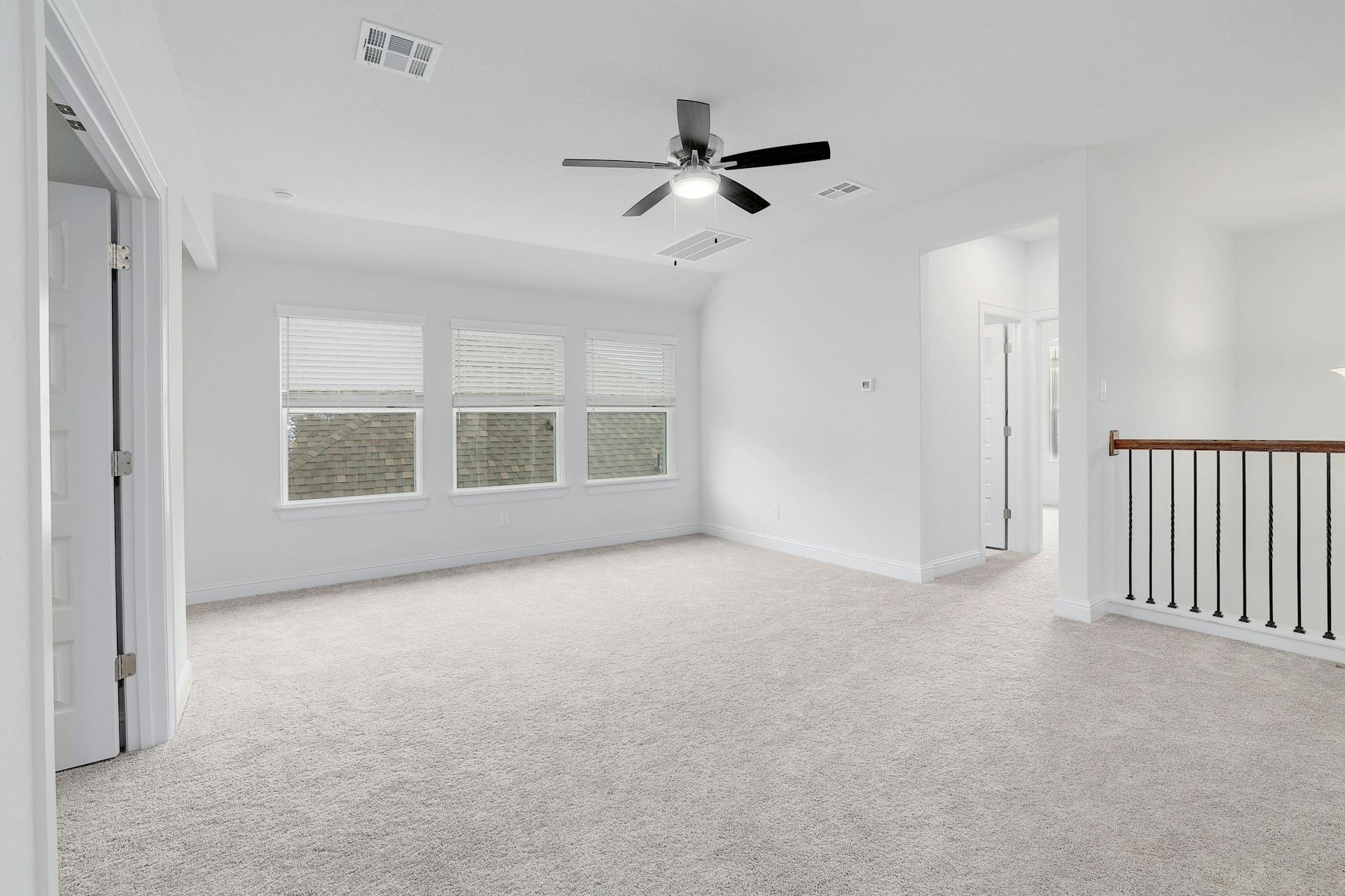 2040 Base Burner Path Leander, TX 78641 - Photo 16 of 31 Unfurnished room featuring light colored carpet and ceiling fan