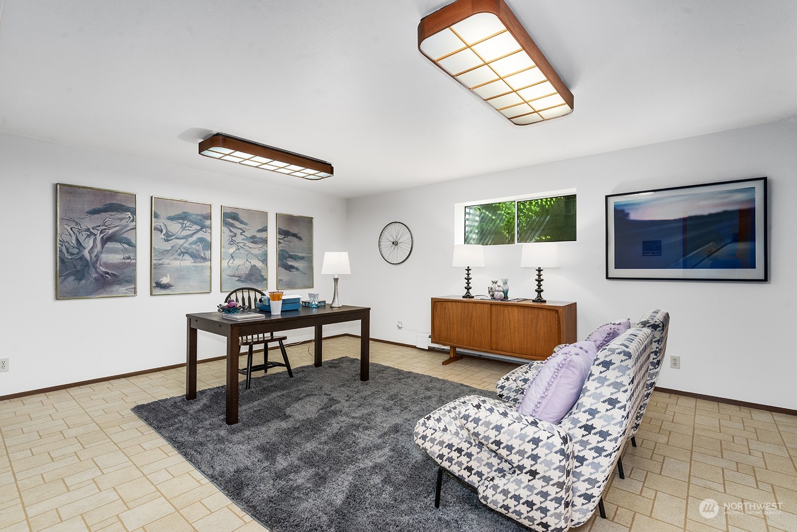 3513 West Howe Street Seattle, WA 98199 - Photo 25 of 39 a living room with furniture and a window