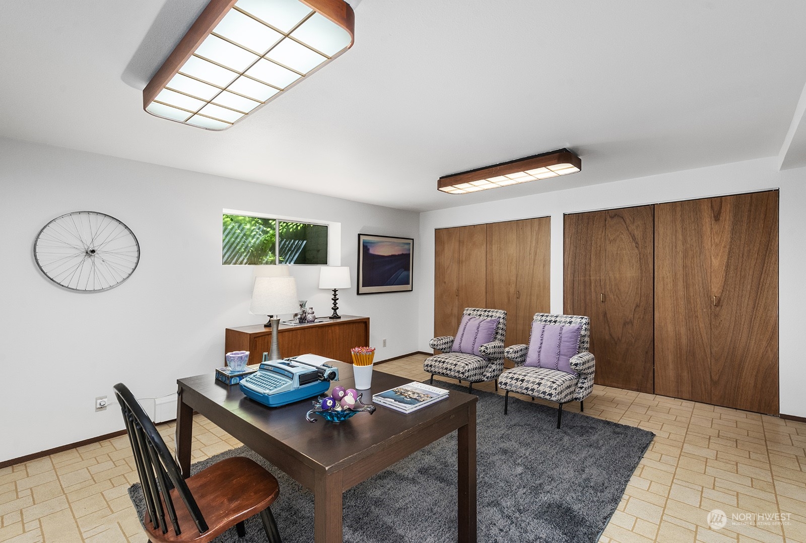3513 West Howe Street Seattle, WA 98199 - Photo 26 of 39 a living room with furniture and a window