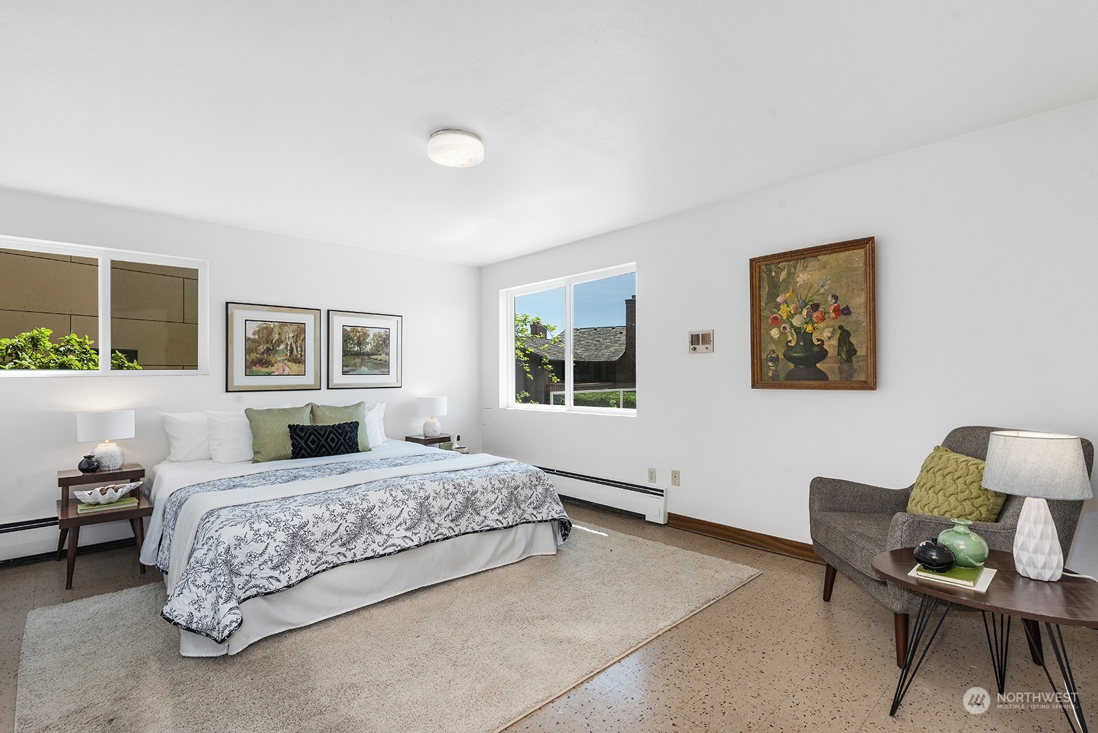 3513 West Howe Street Seattle, WA 98199 - Photo 27 of 39 a bedroom with a bed and a couch