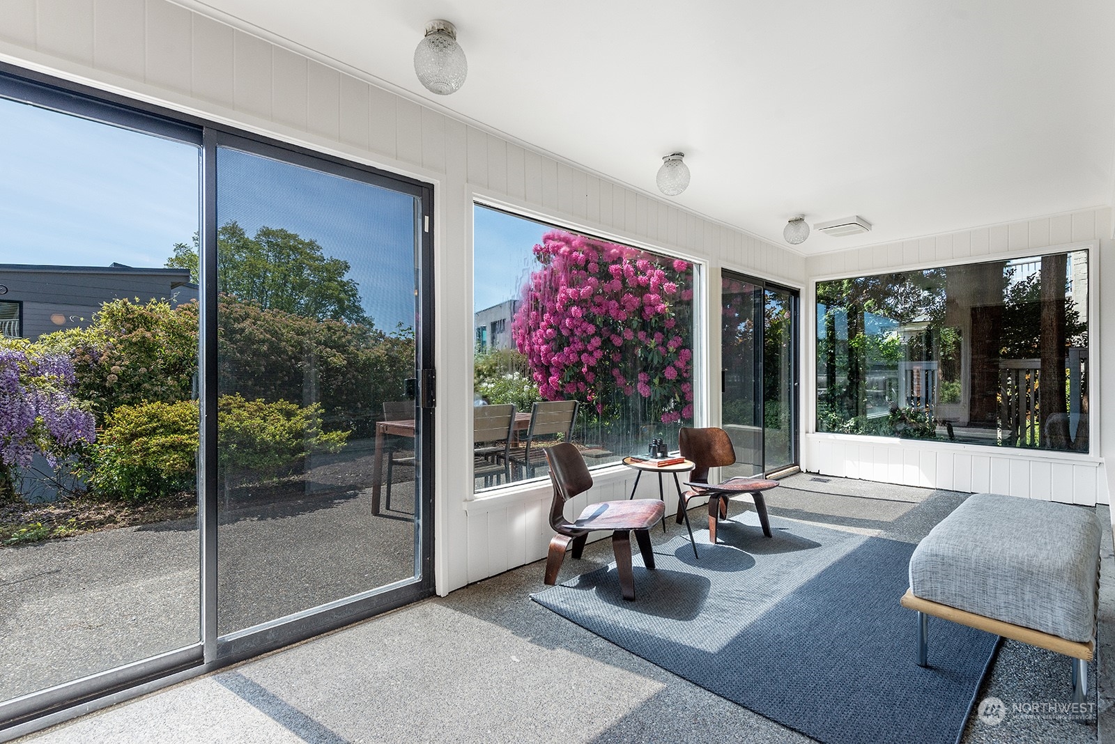 3513 West Howe Street Seattle, WA 98199 - Photo 30 of 39 a living room with furniture and garden view