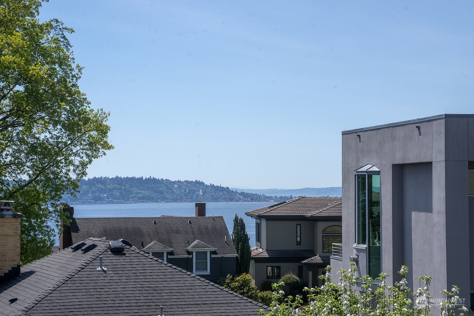 3513 West Howe Street Seattle, WA 98199 - Photo 38 of 39 a front view of a house with a yard